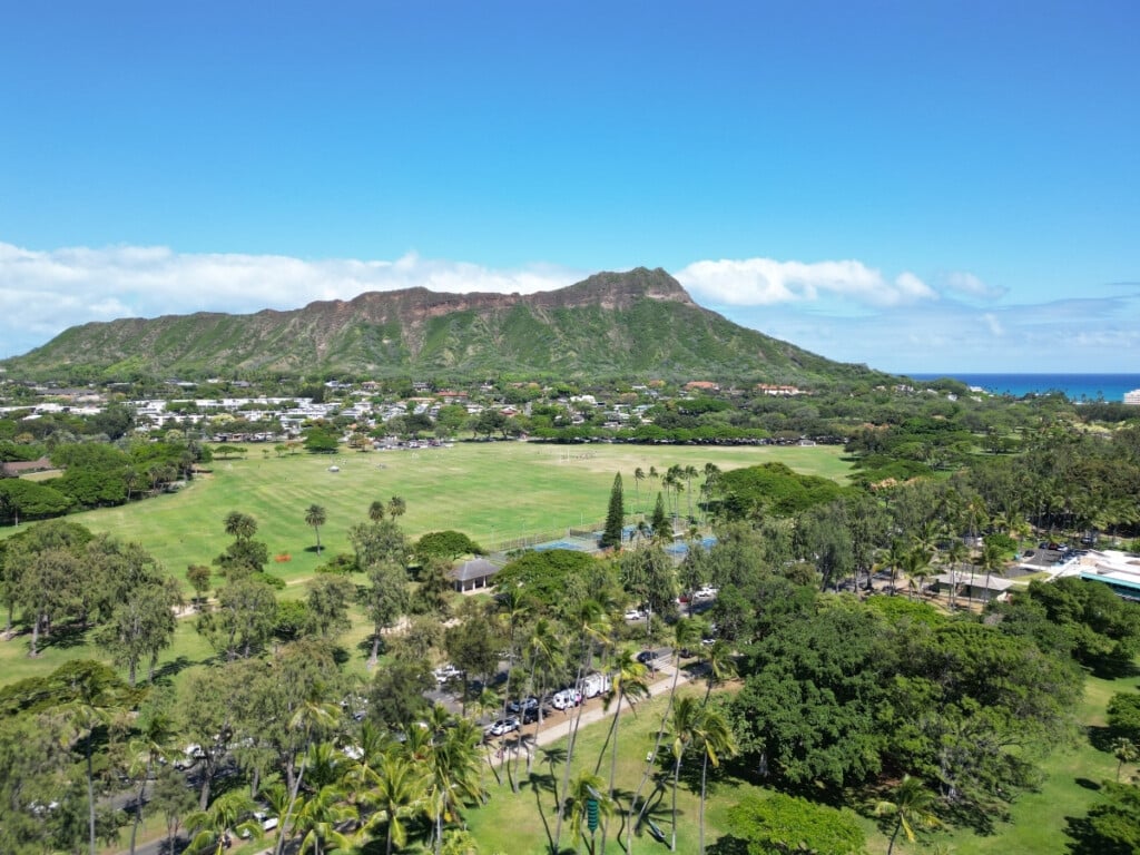 Aerial view of Queen Kapiʻolani Park, nestled at the base of Diamond Head.