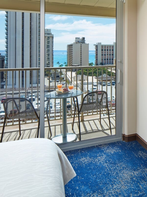 View from the balcony at Hilton Garden Inn Waikiki Beach with partial ocean view of and Waikīkī's skyline.