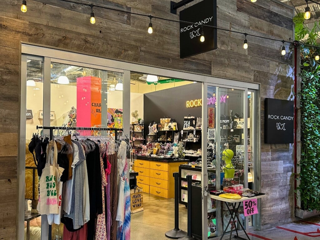 Exterior shot of Rock candy boutique store at South Shore Market with colorful apparel & accessories.