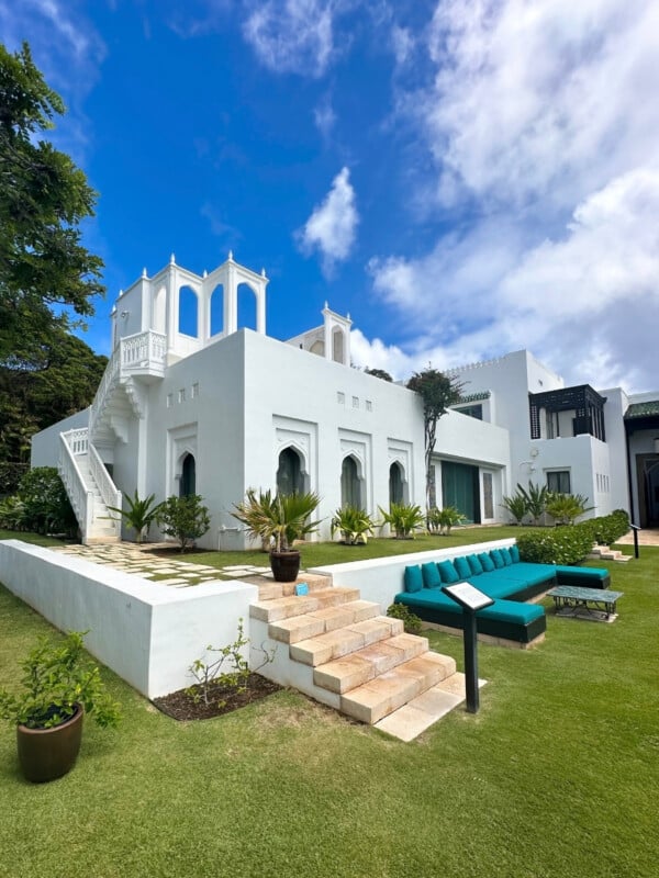The exterior of the Shangri La Museum of Islamic Art, Culture & Design, a white building with a unique design.