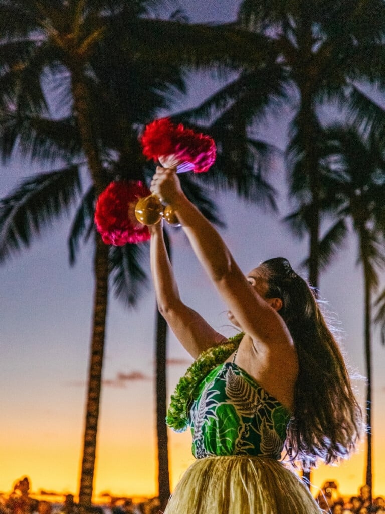 Hula performance at sunset at Kūhiō Beach Hula Show, Waikīkī, Oʻahu.