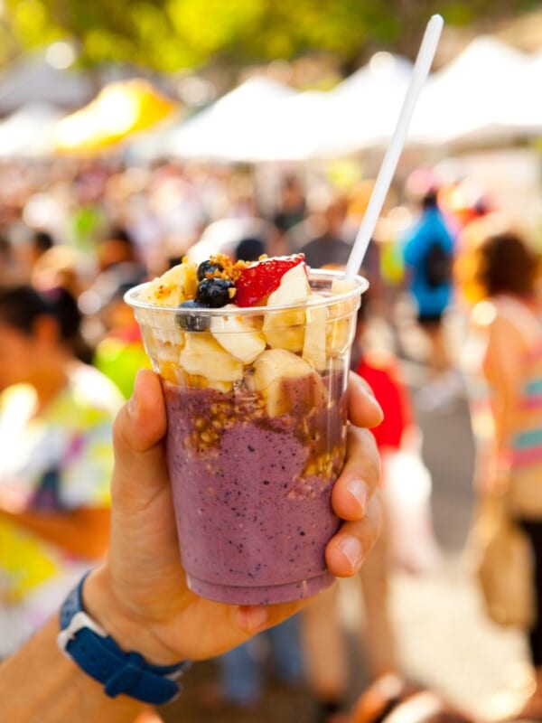Enjoying a cup of açaí at the KCC Farmers Market in Diamond Head, Oʻahu, Hawaiʻi.
