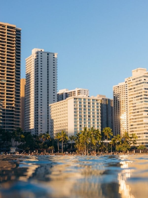 A view of ʻAlohilani Resort Waikīkī Beach hotel from the ocean looking back to shore