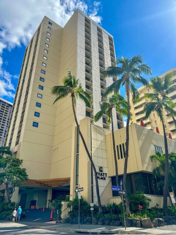 The Hyatt Place Waikiki Beach yellow building on Paoakalani Ave in Waikīkī