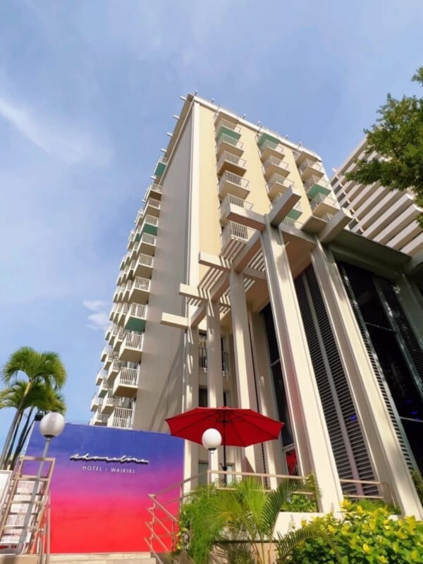The Shoreline Hotel Waikiki building looking up from the street