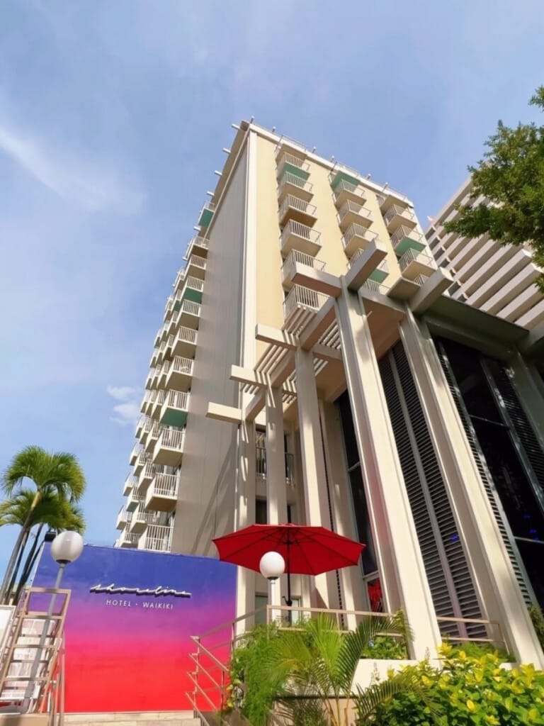The Shoreline Hotel Waikiki building looking up from the street