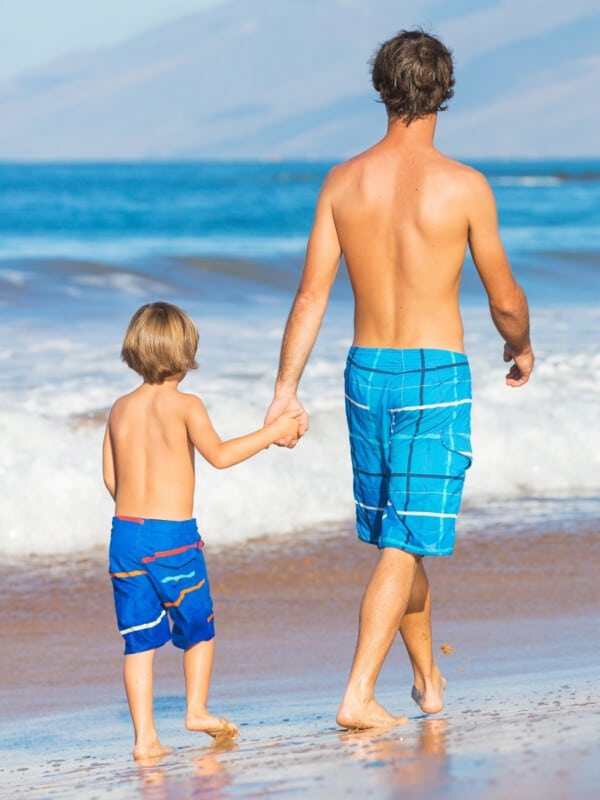 Father's Day father and son in tropical destination.