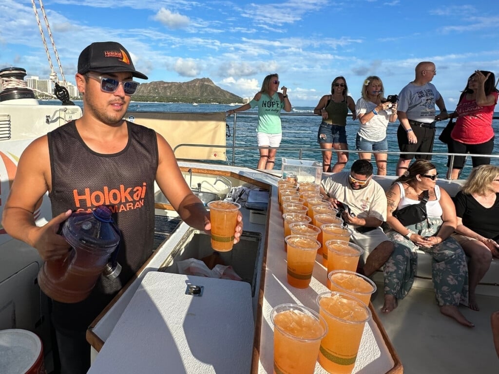 Sailing in a catamaran off the Waikīkī coast.