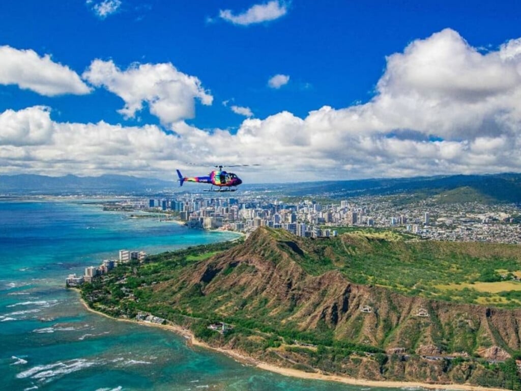 Rainbow Helicopter flying above Diamond Head