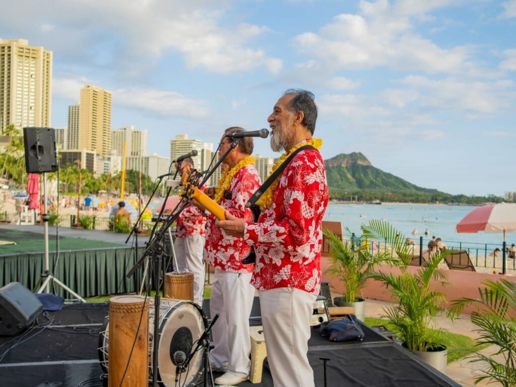 With Diamond Head as the stunning backdrop, guests enjoy traditional music, with storytelling and the sweet sounds of the ukulele and slack-key guitar and other traditional Hawaiian instruments at the Aha‘aina Luau at The Royal Hawaiian.
