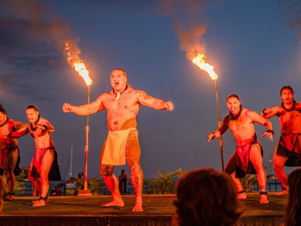 Male dancers showcase a captivating blend of strength and grace while performing hula at the Ahaʻaina Luau.