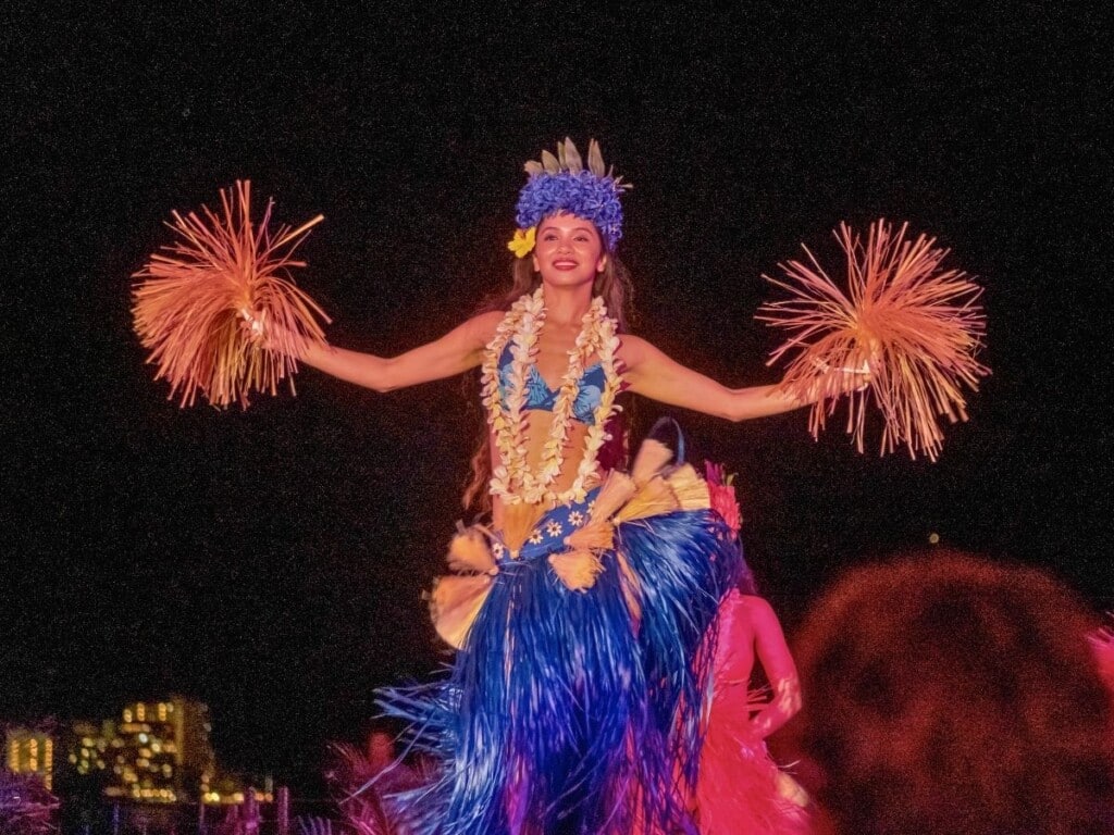 An energetic energetic Tahitian Ori dance performance at Ahaʻaina Luau at the Royal Hawaiian .
