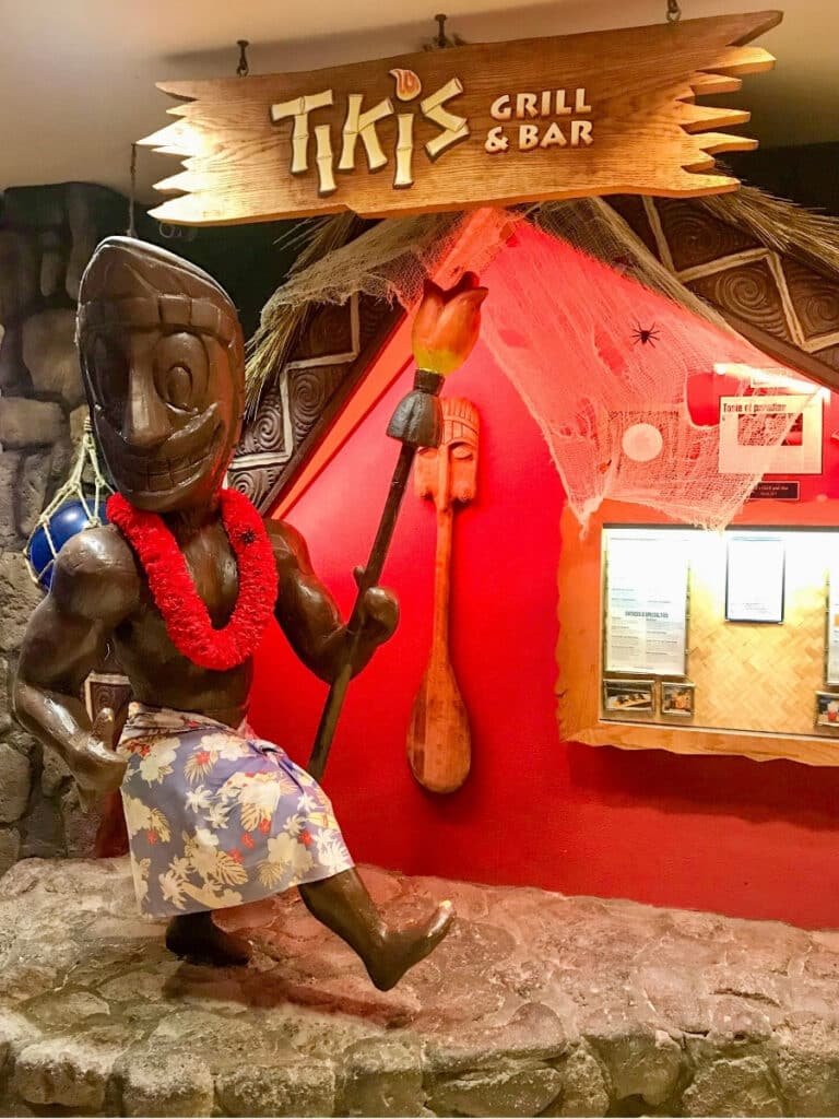 Theming inside Tiki's Grill & Bar in Waikīkī, giving the restaurant a lively, vintage Hawaiʻi vibe.