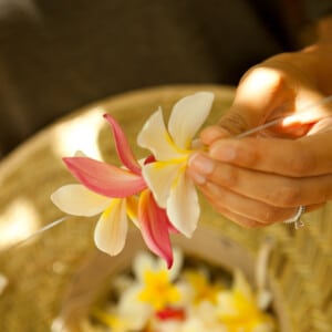 Making lei in Hawaiʻi.