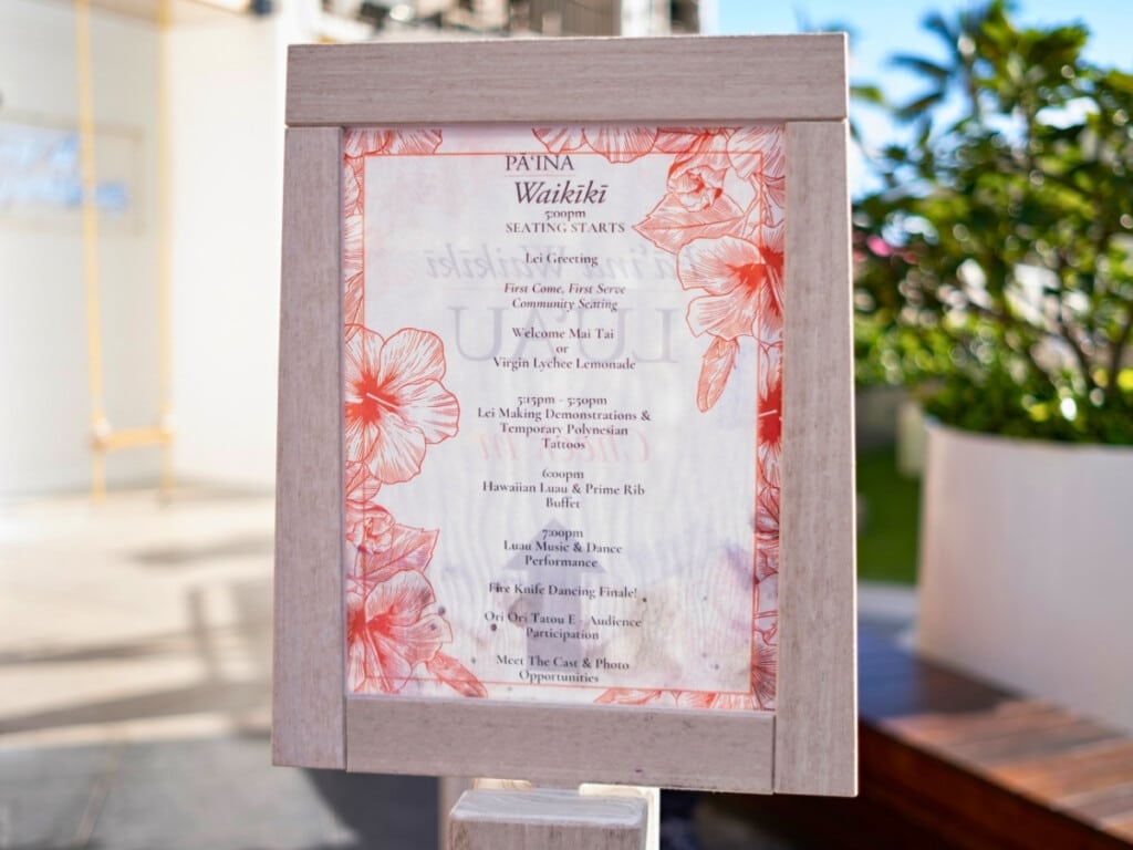 The sign for at Pāʻina Waikīkī Lūʻau which shows that seating is on a first-come, first-serve basis. It shows the timings of the whole evening.