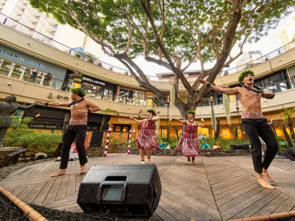 Hula dancers provide an traditional Hawaiian entertainment at the Queens Waikiki Luau.