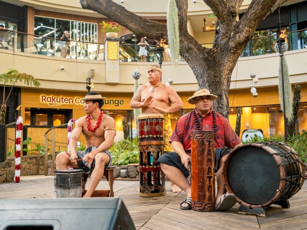 Band playing traditional instruments at the Queens Waikiki Luau.