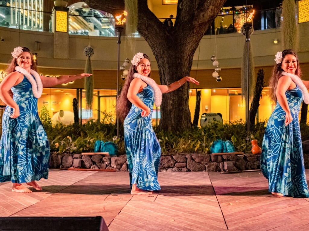 Hula dancers provide an upbeat entertainment at the Queens Waikiki Luau.