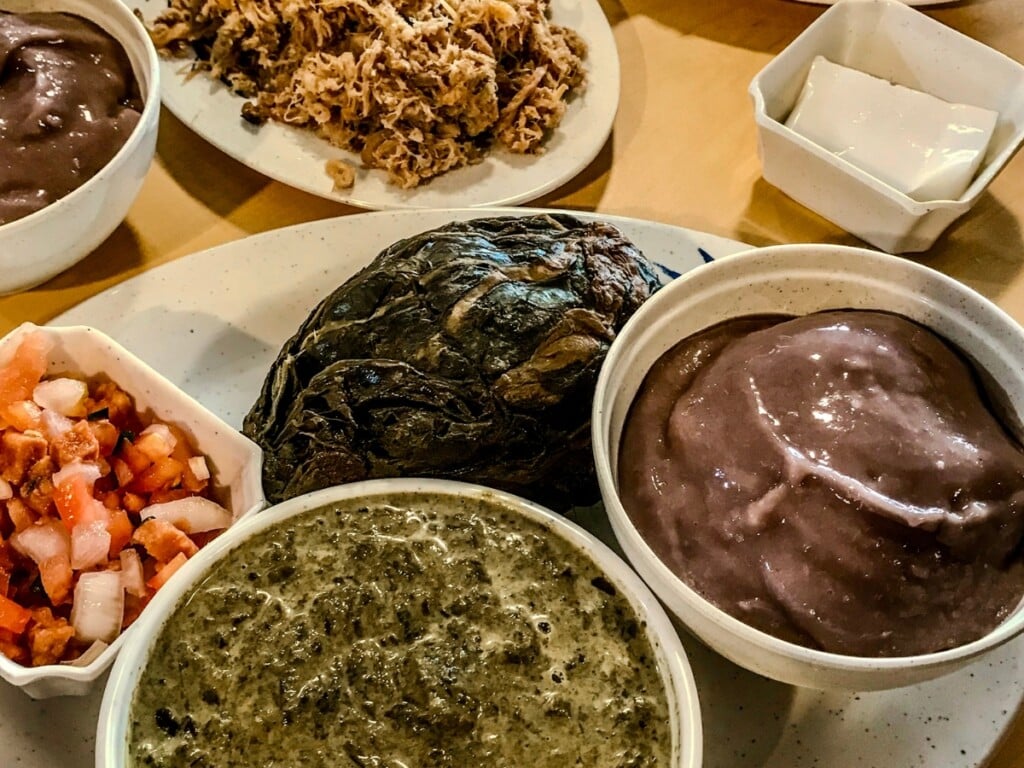 Oahu Grill local eat traditional Hawaiian dishes including Kalua pork and poi.