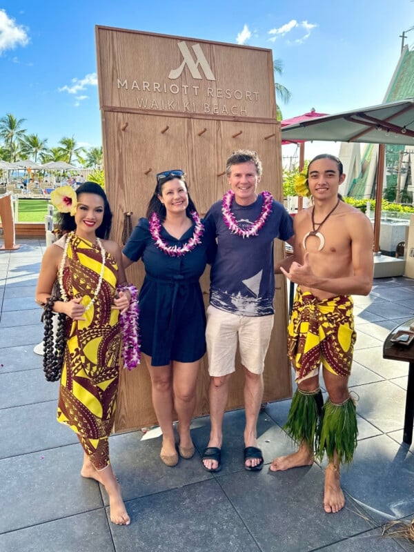 Ashlee and Darragh being welcomed to the Pāʻina Lūʻau Waikiki at the Waikiki Beach Marriott.