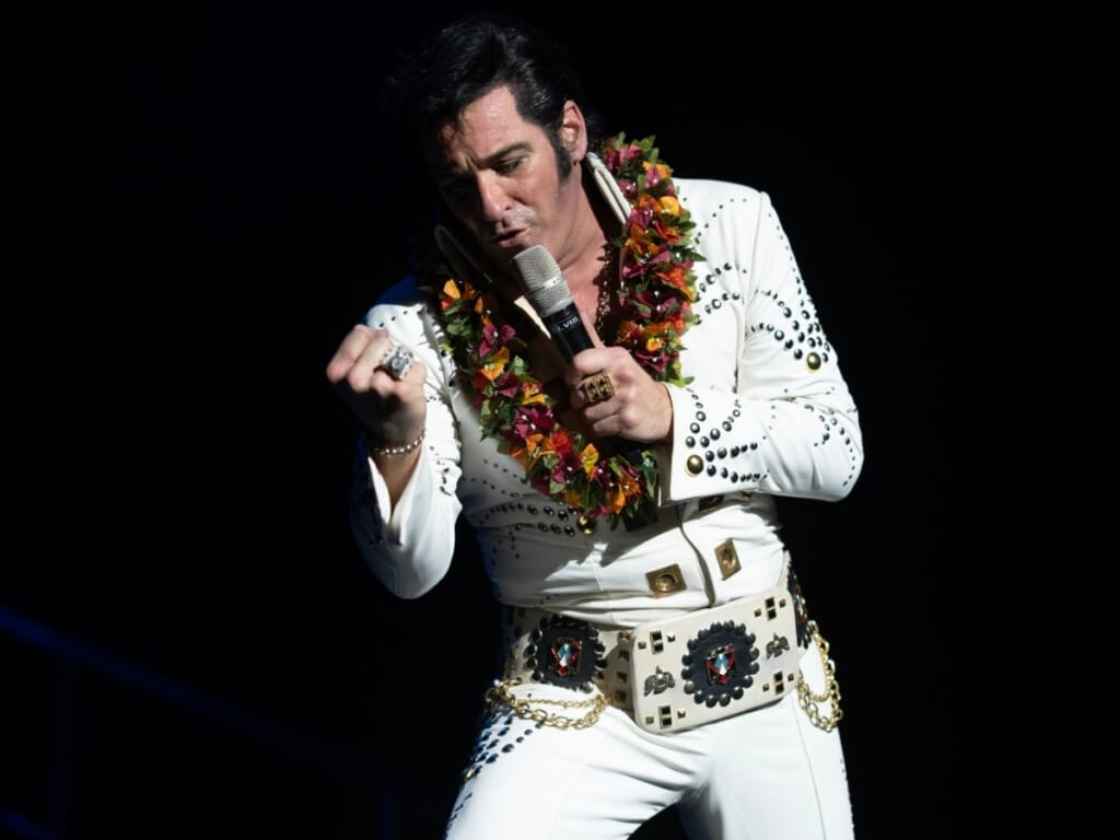 An Elvis Presley impersonator performing in the Rock-A-Hula Show in Waikīkī, Hawaiʻi.