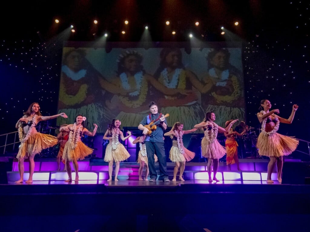 Performers on stage in the Royal Hawaiian Theater.