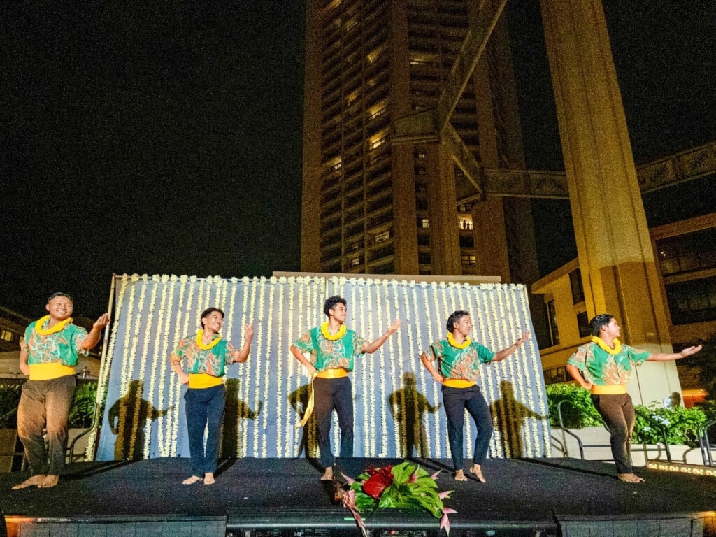 The young vibrant dancers light up the stage with high-energy moves at the Nā Lei Aloha lūʻau.