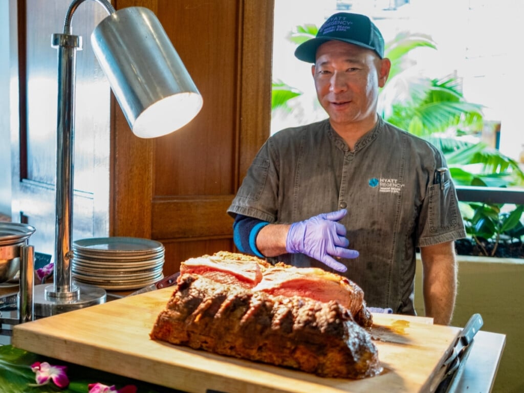 Korean-spiced prime rib takes the spotlight at the carving station at the Nā Lei Aloha Waikīkī lūʻau.