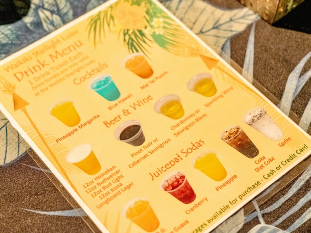 The drink menu at at Waikiki Starlight Luau: Ocean Lawn, offering classic Hawaiian cocktails including Mai Tais and Blue Hawaiis as well as beer, wines and juices..
