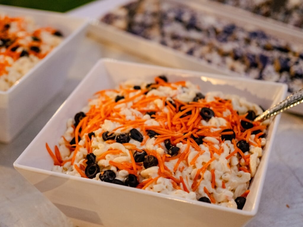 Pasta salad with black olives and grated carrot on top at the Waikiki Starlight Luau: Ocean Lawn.