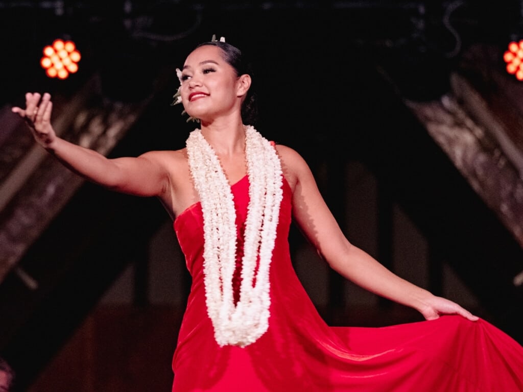 Hawaiian hula dancer performing at Waikiki Starlight Luau: Rooftop.