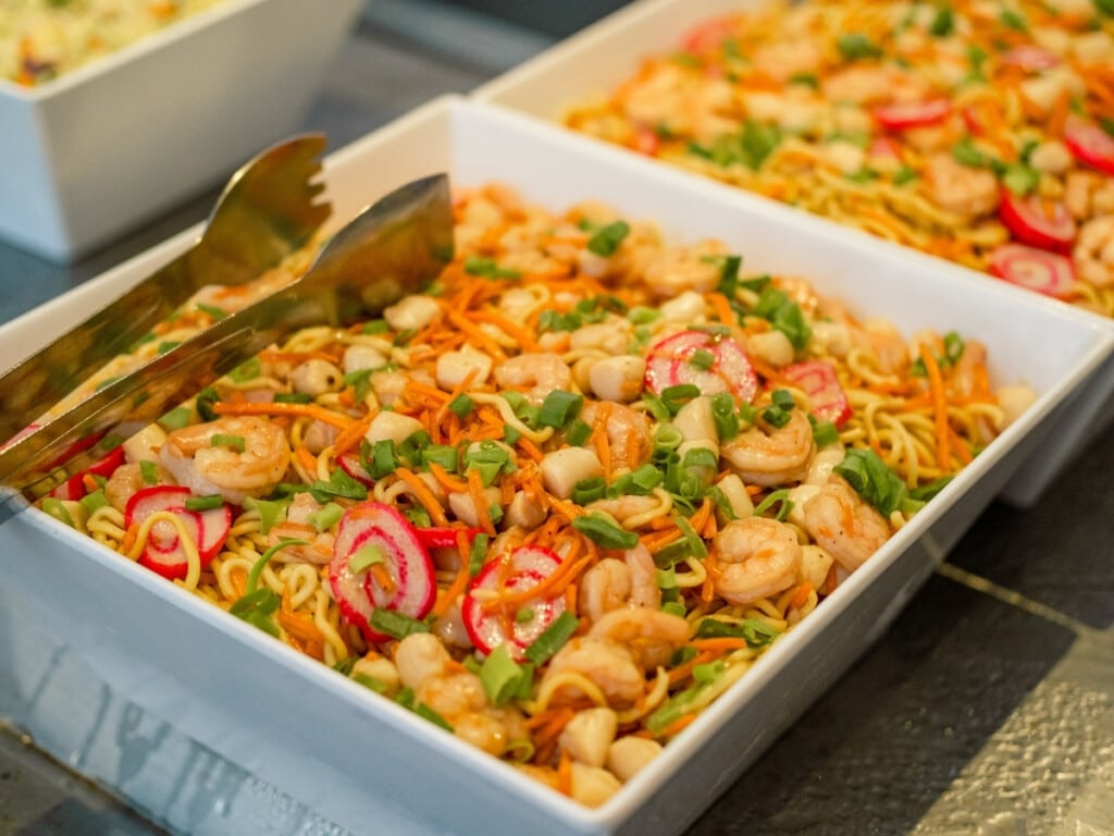 Soba Noodle Salad with seafood and shrimp garnished with spring onions and carrots at the Waikiki Starlight Luau.