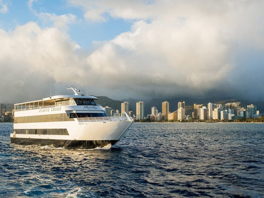 The Atlantis Cruise ship off the coast of Waikīkī Beach and Honolulu.