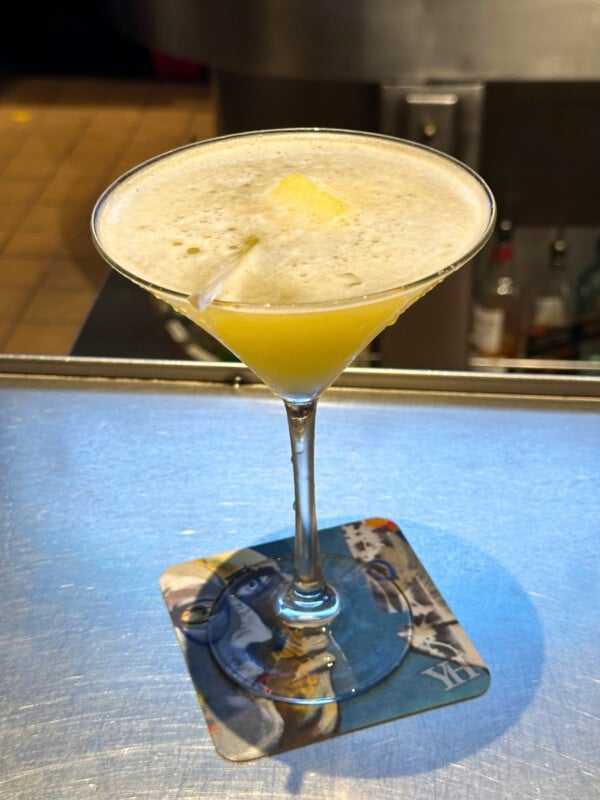 A Pineapple Lych-ini cocktail at Yard House Waikiki with soho lychini, pau vodka, citrus agave, pineapple juice & fresh pineapple.