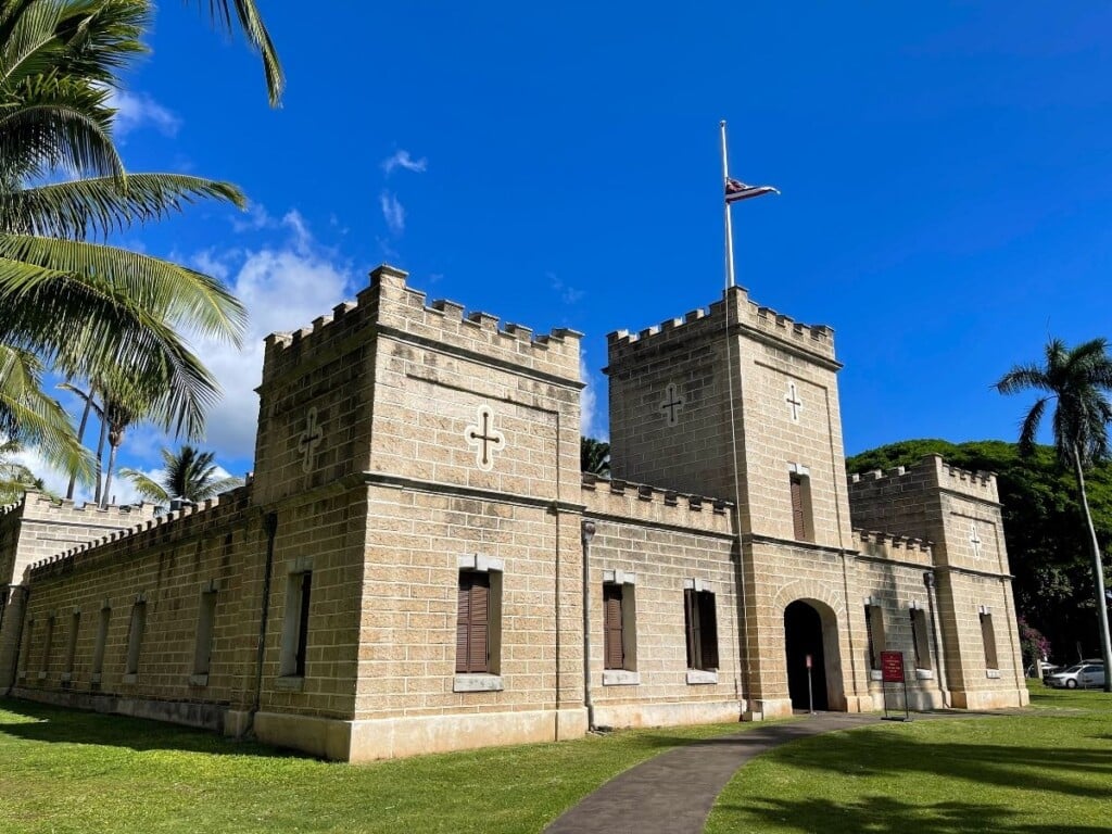 Hale Koa/ʻIolani Barracks, located on the Palace Grounds) before starting their tour near the rear of ʻIolani Palace.