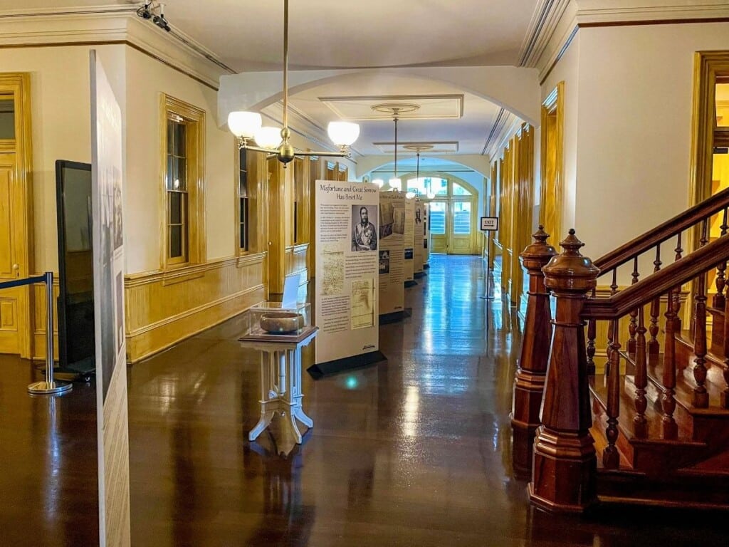 The Basement Gallery exhibition space showcasing royal history at ʻIolani Palace.