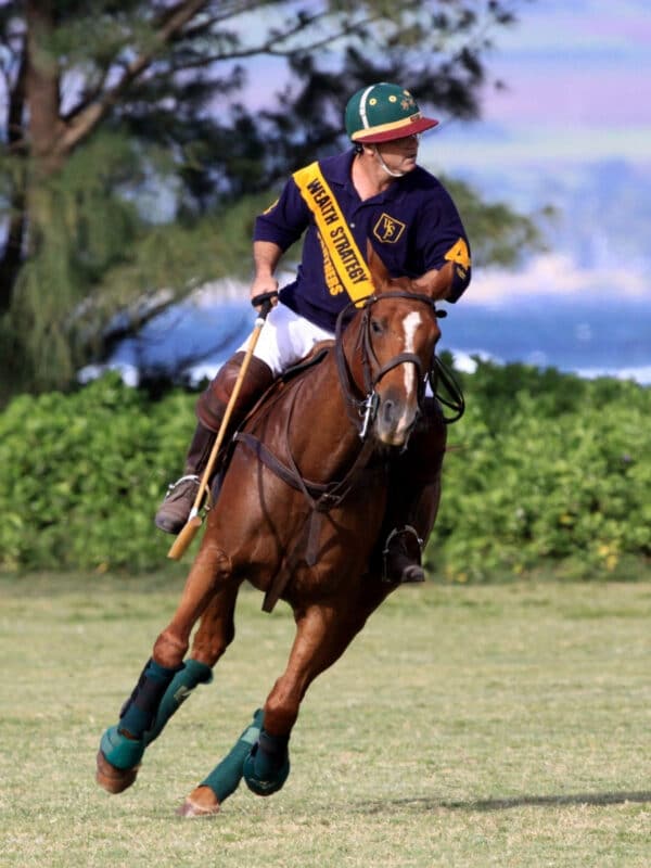 A polo match at Mokuleia Polo Field on Oʻahu's North Shore during Hawaiʻi's polo season.